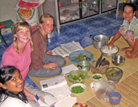 Help prepare delicious food with host family
