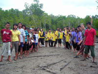 Getting down and dirty in the mangroves, two town schools visit the Ban Talae Nok Youth Conservation Group to share ideas about conservation.