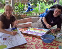 Irina and Paul making Batik prints while staying at a homestay.