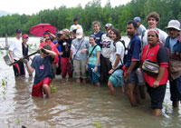 American students learning about the local way of life with a local guide.