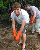 Josh working on the mangrove restoration after partying hard at the Full Moon Party.