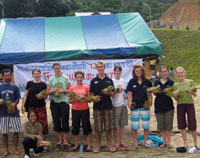 The volunteers join a community planting day at the local school.