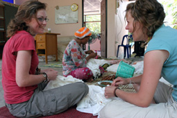 Sally and friend making tie-die in Pak Triam