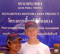Jenny and friend help with mangrove restoration