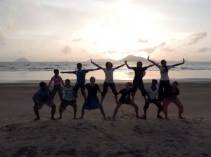 Gymnastics on the beach with homestay hosts