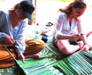 Weaving pandanus leaves Ban Talae Nok homestay Thailand