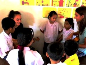 Volunteers in Thailand teaching ukulele